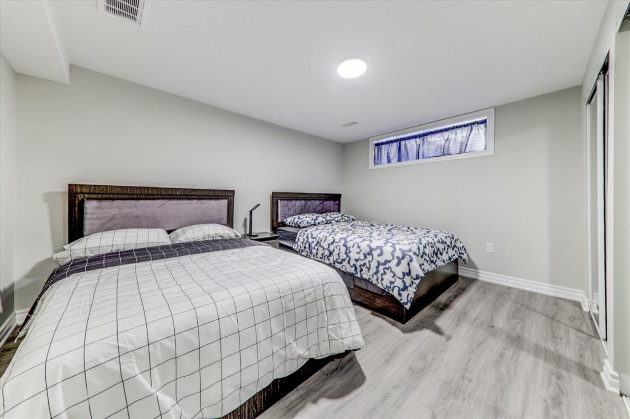 Stunning 7 Bedroom Rougeview With 2 Kitchens, 5 Bathrooms, Amazing Backyard & 8-car Parking Toronto